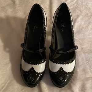 Black and white neat heels